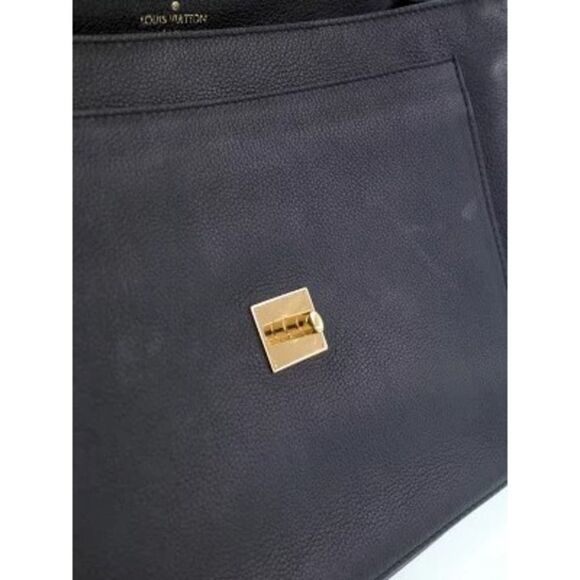 Louis Vuitton Lock Me MM Handbag - Picture 4 of 9